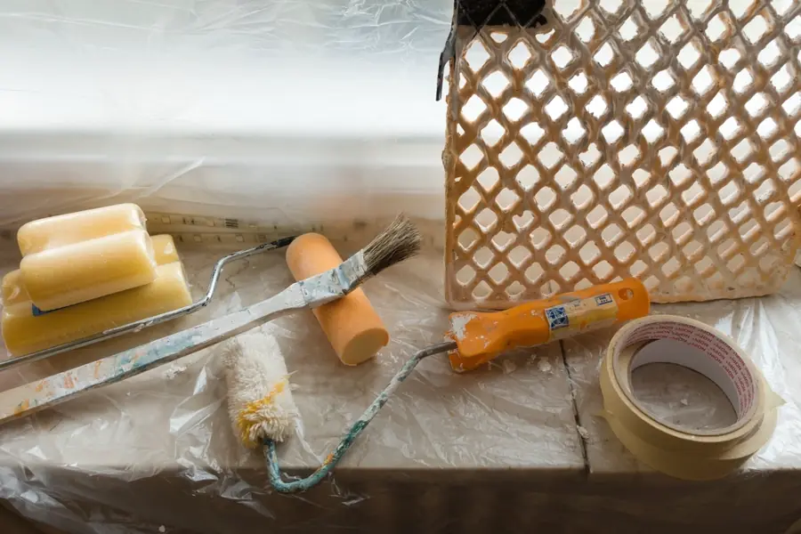 Decorating tools laid out on a dust sheet